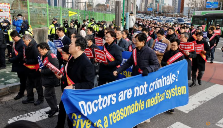 South Korean doctors march to protest against the government medical policy in front of the Presidential Office in Seoul, South Korea, on Feb 25, 2024. (File photo: REUTERS/Kim Soo-Hyeon)