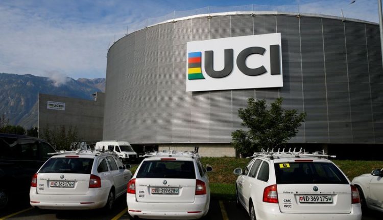 Cycling-UCI bans 'head sock', will review TT helmet design