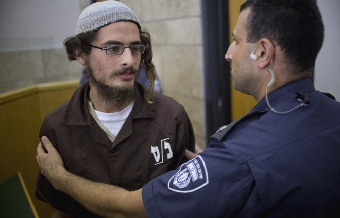 The head of a Jewish extremist group Meir Ettinger appears in court in Nazareth Illit, Israel on Aug. 4, 2015. (File/AP)