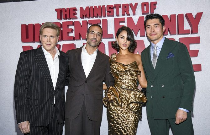 Eiza Gonzalez turned heads at the premiere of the Saudi-backed action movie 'The Ministry of Ungentlemanly Warfare' alongside Saudi Arabia's Red Sea Film Foundation CEO Mohammed Al-Turki, pictured center-left. (Getty Images)