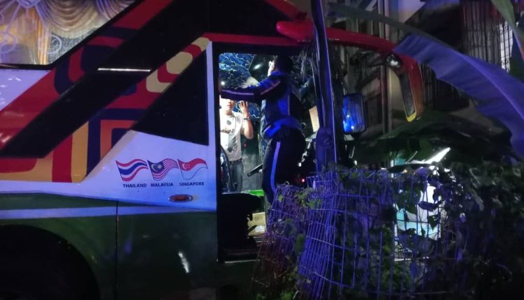The bus carrying passenger flipped over and collided with five more cars