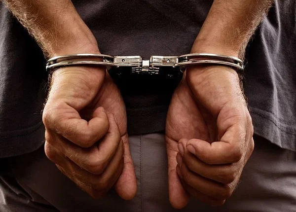 Two local men were detained after setting a KL entertainment outlet on fire