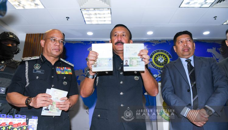 Two individuals were apprehended in Kajang after a fake passport syndicate was busted