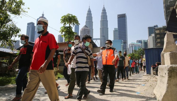 Increased number of foreign workers arriving as companies scramble to meet tomorrow's deadline