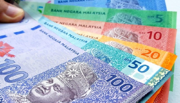 The ringgit closed lower against the US dollar