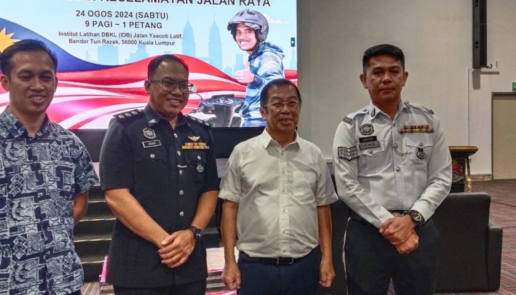 Cheras MP distributes 140 Madani helmets to students