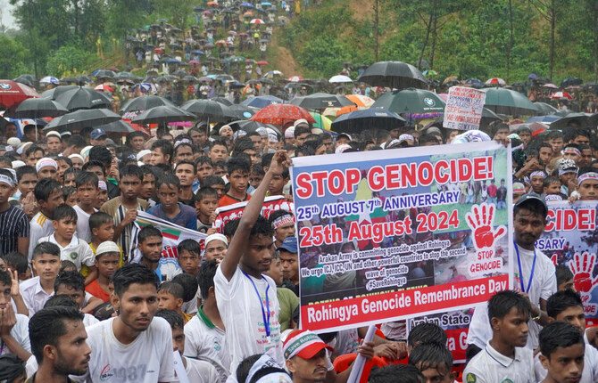 Rohingya refugees gather to mark the seventh anniversary of their fleeing from Myanmar to escape a military crackdown in 2017, in Cox’s Bazar, Bangladesh, August 25, 2024. (Reuters)