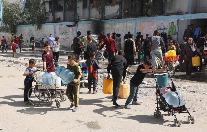 Displaced Palestinians seek shelter at a UN run school in northern Gaza Strip on Oct. 25, 2024. (AFP)