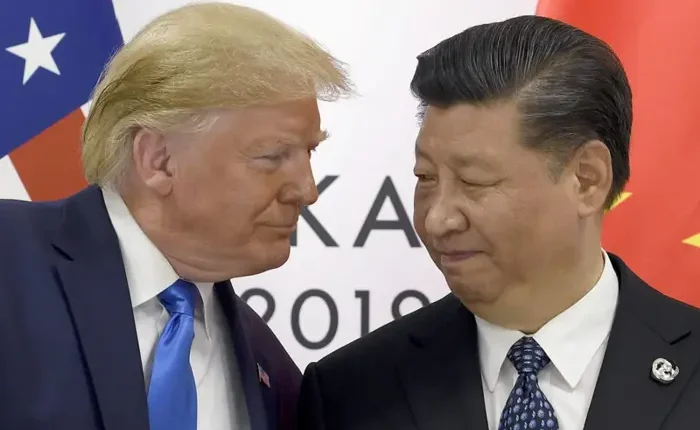 This photo from June 29, 2019, shows US President Donald Trump and Chinese President Xi Jinping having a conversation outside of the G-20 meeting in Osaka, Japan