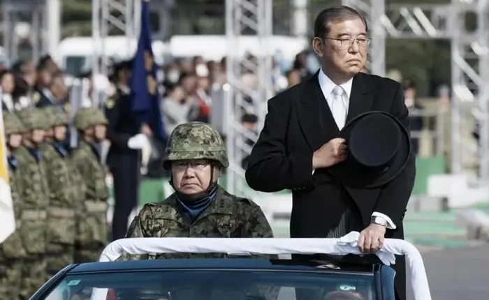 On Saturday, Nov. 9, 2024, Prime Minister Shigeru Ishiba conducts an annual troop review at Camp Asaka in Tokyo suburbs