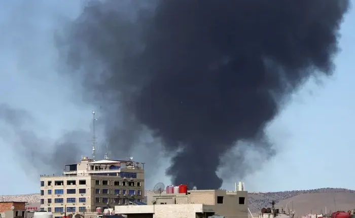 Qamishli, Syria's Kurdish-controlled northeast, smokes