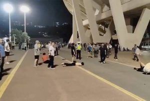 Wounded people lie on the ground after a suspected hit-and-run attack outside a sports centre, in Zhuhai, China, November 11, 2024, in this still image taken from a social media video. - Social Media/via REUTERS