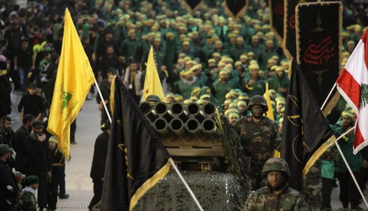 In this file picture, fighters from the Lebanese Resistance movement Hezbollah parade in Nabatiyeh city, southern Lebanon