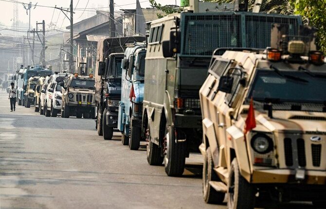Above, Indian security force vehicles deploy near the site of a gunbattle between suspected militants and Indian forces in Srinagar on Nov. 2, 2024. (AFP)