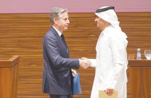 US SECRETARY of State Antony Blinken shakes hands with Qatari Prime Minister and Foreign Minister Mohammed bin Abdulrahman Al Thani, in Doha