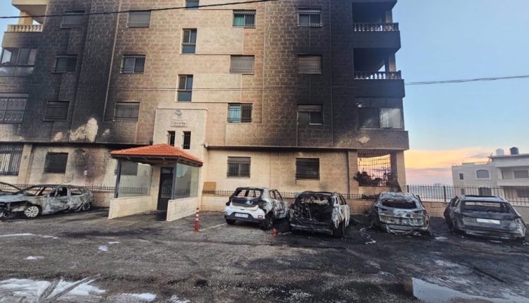 The photo by the Palestinian Wafa news agency shows the aftermath of a settler attack in an area of the occupied West Bank