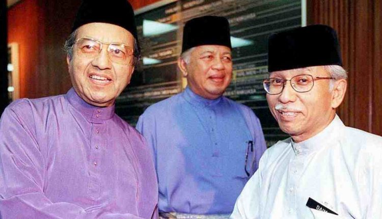 Tun Dr Mahathir Mohamad (left) with his friend, the late Tun Daim Zainuddin (right)