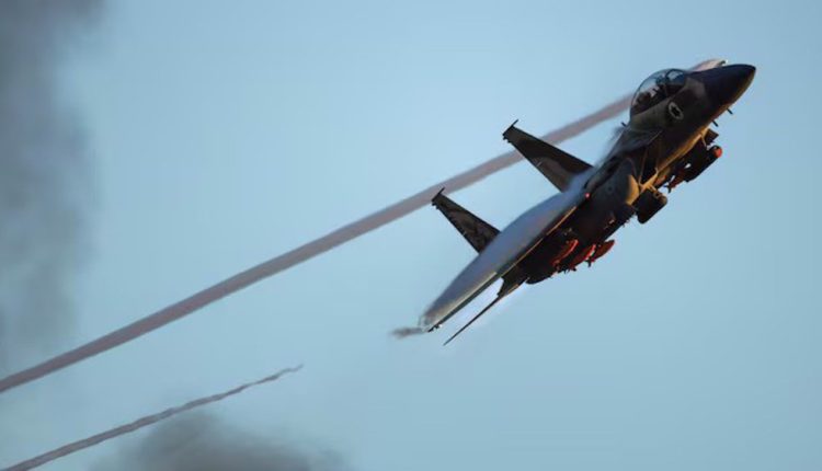 A F-15 fighter jet flies during a graduation ceremony for Israeli pilots at Hatzerim airbase, in southern Israel