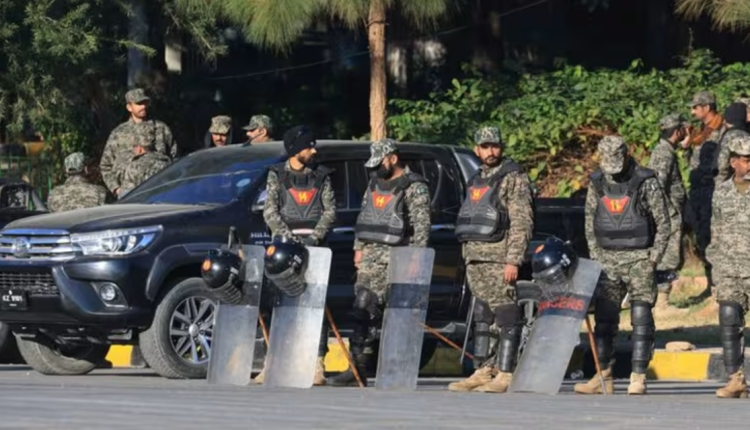Pakistani Rangers guard an area after security forces launched a raid on supporters of the former Pakistani prime minister Imran Khan's party Pakistan Tehreek-e-Insaf (PTI), in Islamabad, Pakistan