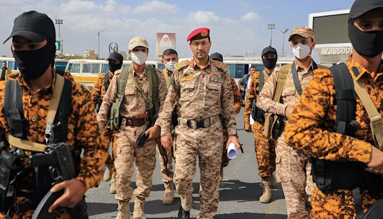Yemeni Army spokesman Brigadier General Yahya Saree is seen (center) in this file photo.