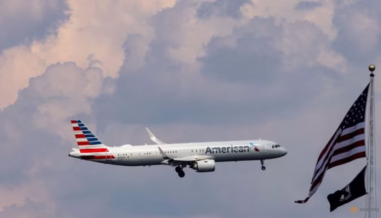 An American Airlines commercial aircraft flies over Washington as it approaches to land at Dulles International Airport, as seen from Washington, US, Aug 5, 2024. (File photo: REUTERS/ Umit Bektas)