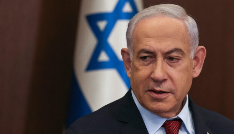 Attaching the weekly cabinet meeting at the Prime Minister's office in Jerusalem is Israeli Prime Minister Benjamin Netanyahu.