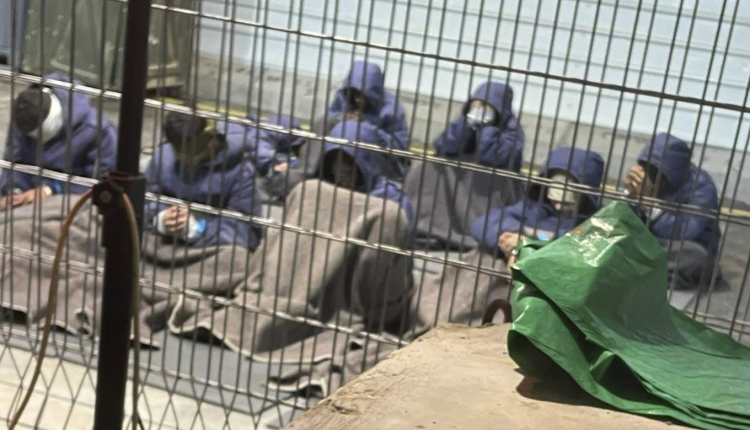 Palestinian prisoners captured in Gaza by the Israeli regime’s forces languish at a detention facility on the Sde Teiman military base