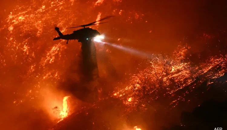 A federal investigation is underway to determine the cause of the wildfires.