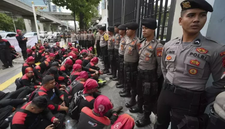 Around 100 protesters gathered outside the Malaysian Embassy in Jakarta on January 30, 2025
