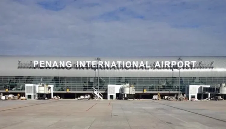 Police say a passenger alerted the cabin crew after seeing the man rummaging through their luggage.