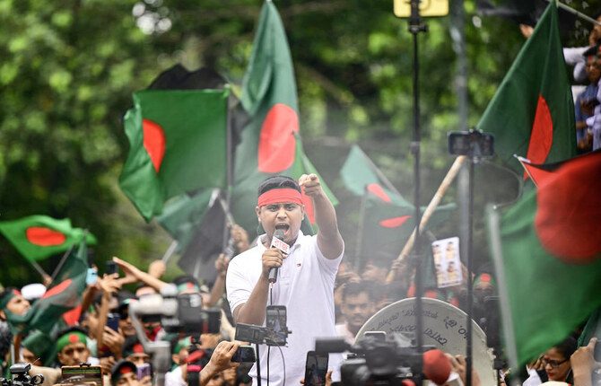A student shouts slogans as demonstrators join the Martyr March, a rally organized by Students Against Discrimination to mark one month to the ousting of the country’s former Prime Minister Sheikh Hasina in Dhaka