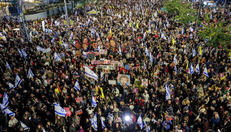 Demonstrators gather in Tel Aviv on March 22, 2025 to protest against Benjamin Netanyahu. (AFP)