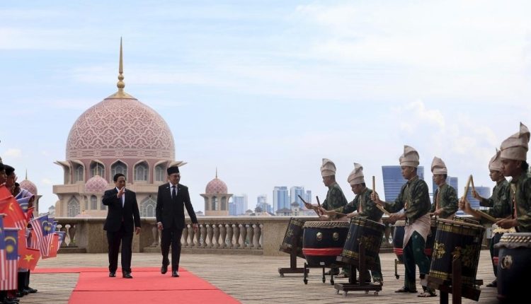 Prime Minister Datuk Seri Anwar Ibrahim (right) with his Vietnamese counterpart, Pham Minh Chinh (left) at the Perdana Putra Complex today.