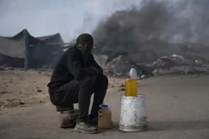 The fuel is sold to passers-by along the Sea Road south of Gaza City