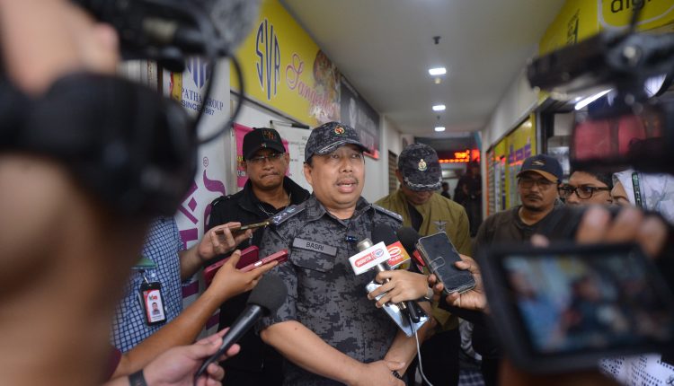 Immigration Department enforcement division director Basri Othman